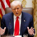 John Bolton surrenders to face charges of sharing classified information